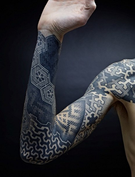 Dotwork Ethnic tattoo sleeve idea