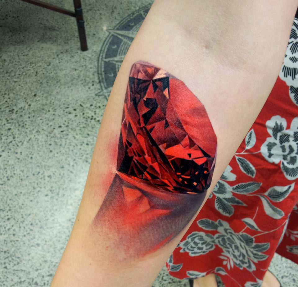 Hand Huge Ruby realistic tattoo