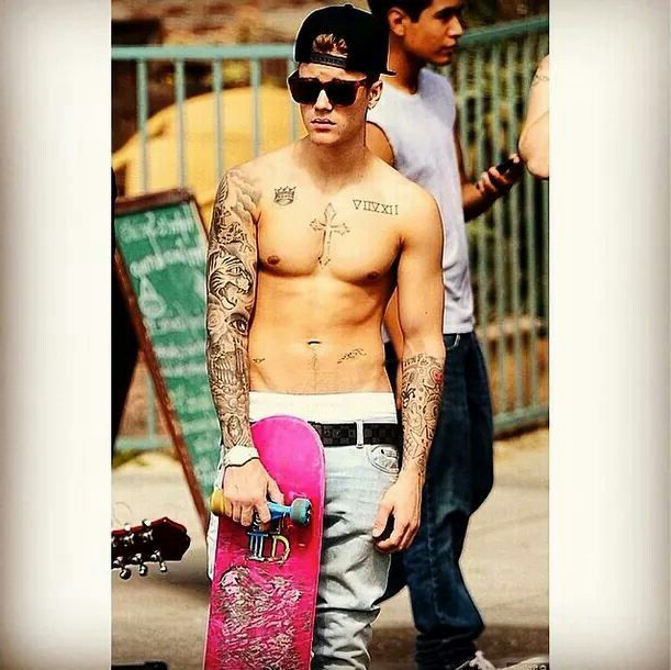 Justin Bieber tattoo with skateboard