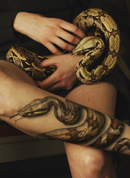 Realistic Snake Hugs 3D tattoo