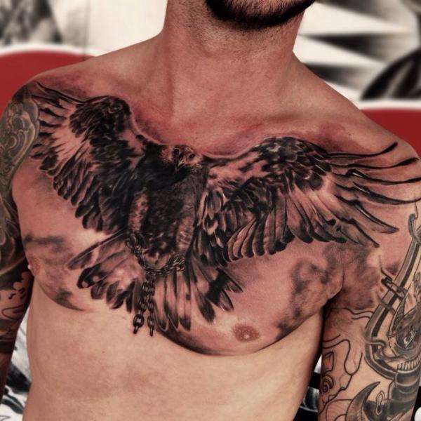 Chain Attack Eagle Realistic tattoo by Drew Apicture