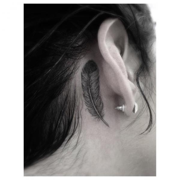 Cool Feather tattoo behind Ear by Dr Woo