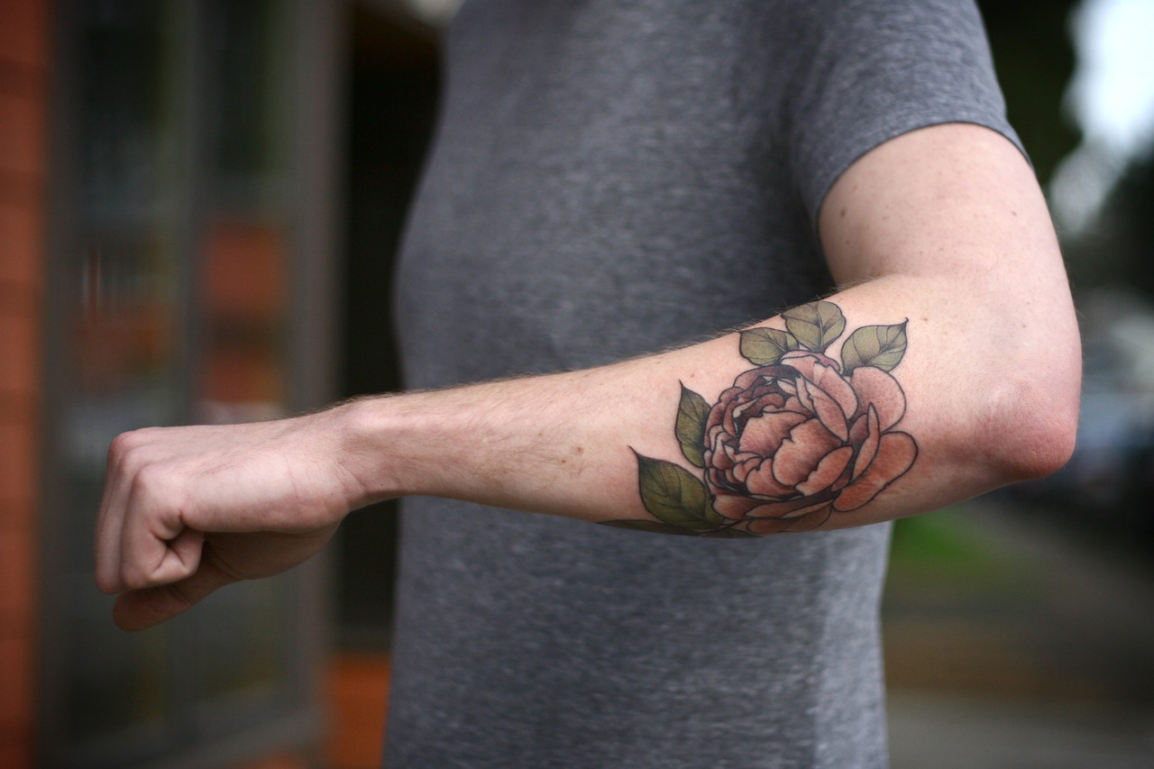 Elbow Lotus Flower Tattoo