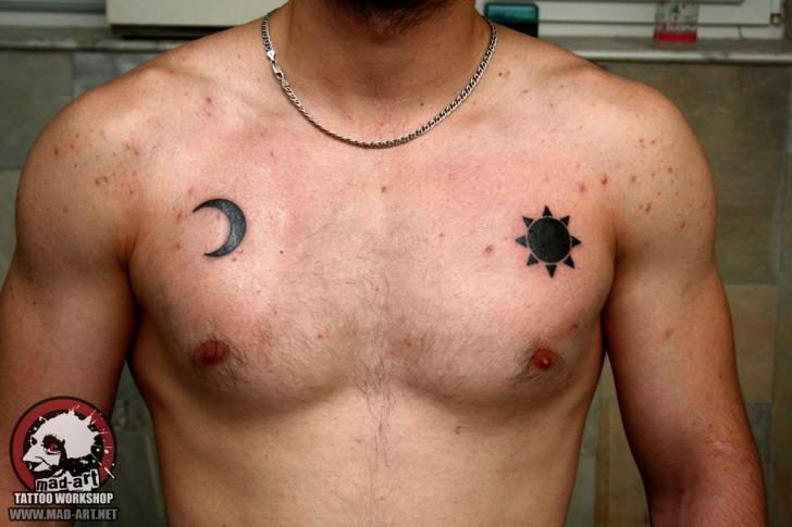 Sum and Moon Blackwork tattoo on Chest by Mad-art Tattoo