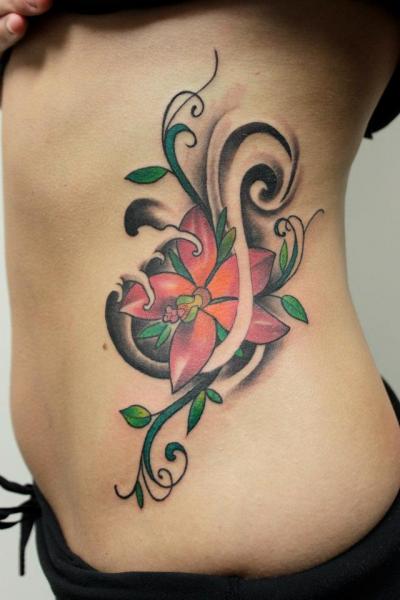 Abstract Flower tattoo by Tantrix Body Art
