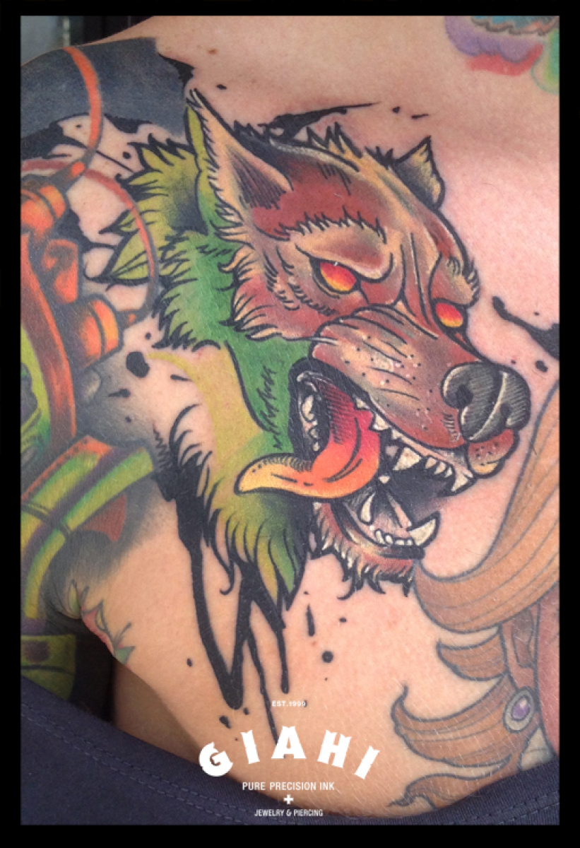 Ripped Skin Angry Wild Dog Tattoo