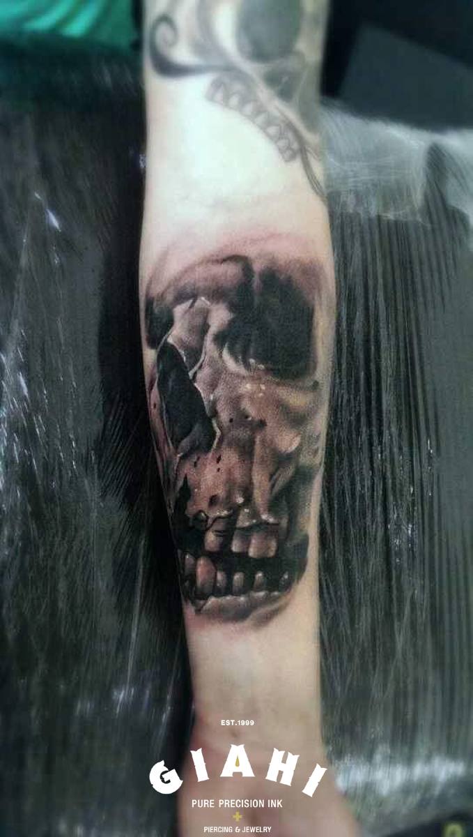 Arm Graphic Toothless Skull tattoo by Goran Petrovic