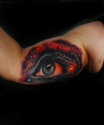 Biceps Space Eye realistic tattoo by Andres Acosta