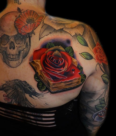 Brown Pages Rose Book tattoo by Andres Acosta