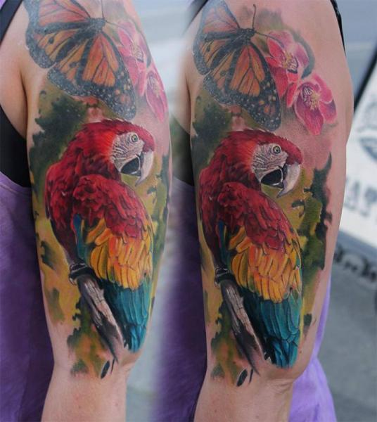 Butterfly and Parrot Realistic tattoo by Piranha Tattoo Supplies