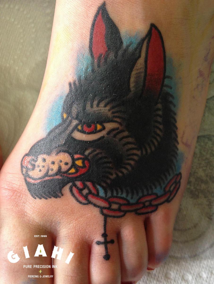 Chained Wolf Foot Old School tattoo by Elda Bernardes
