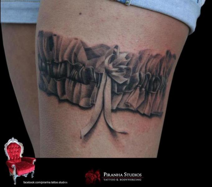 Graphic garter tattoo by Piranha Tattoo Supplies