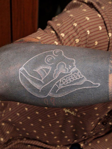 Scull Formed Bent Girl Blackwork tattoo