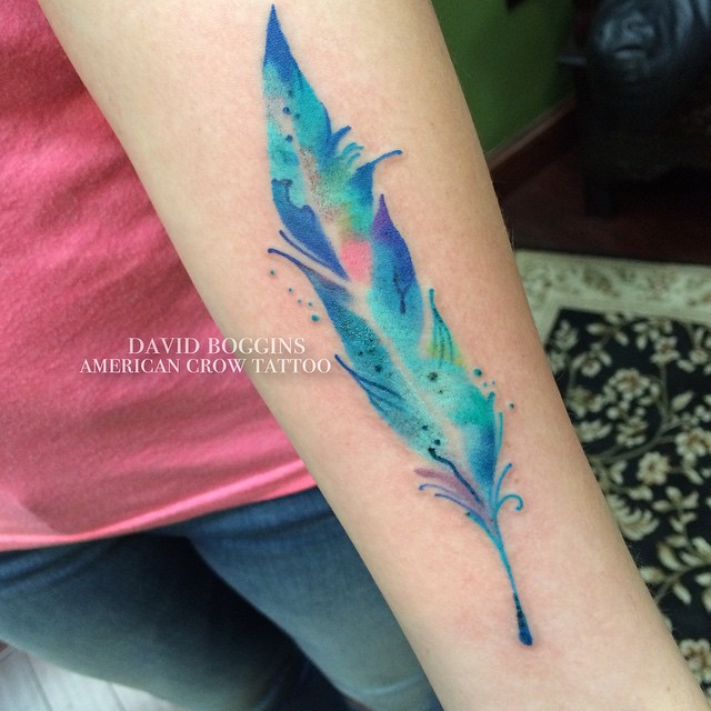 Blue Watercolor Feather Arm tattoo