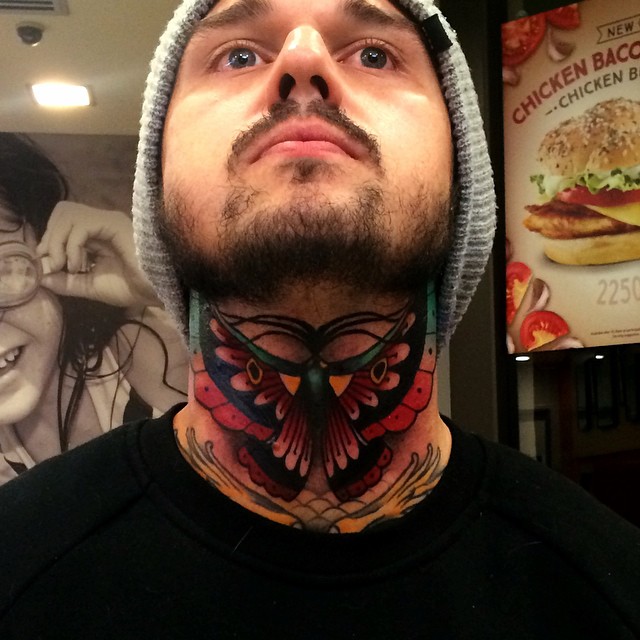 Butterfly on Neck tattoo
