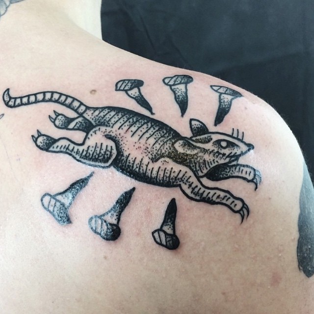 Nailed Rat tattoo