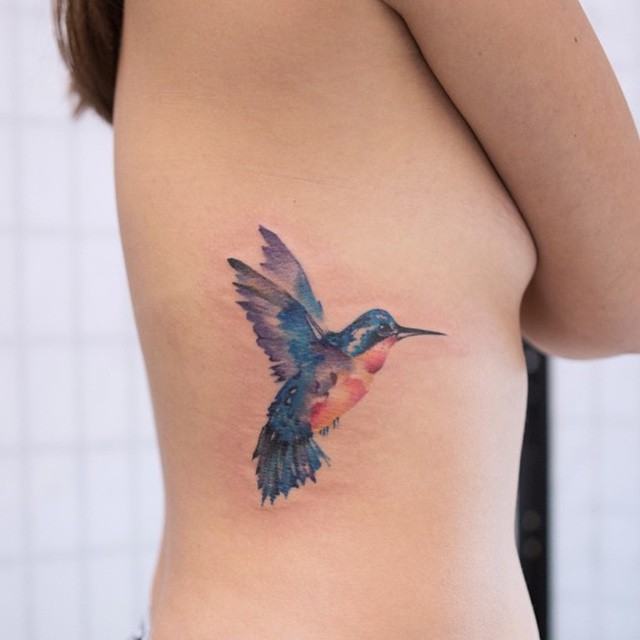Watercolor Humming Bird Tattoo on Side - Best Tattoo Ideas Gallery