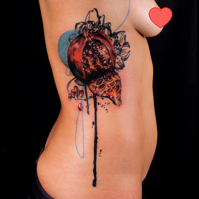 Watercolor Pomegranate Tattoo on Ribs