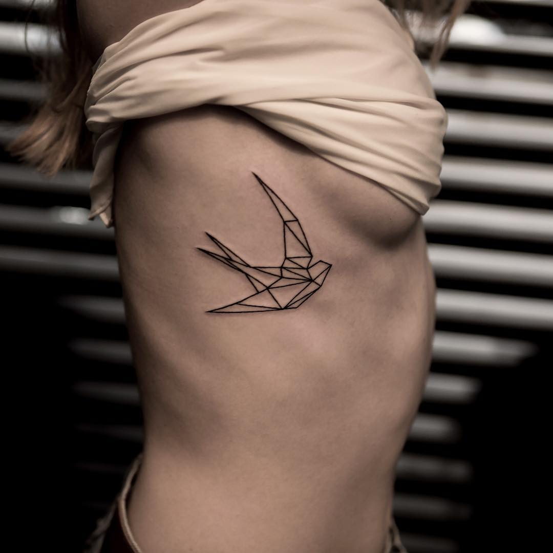 Geometry Swallow Tattoo on Ribs
