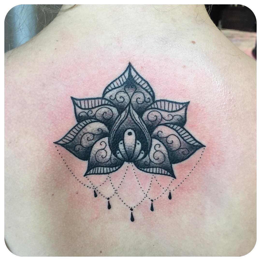 Graphic Baroque Lily Tattoo on Back
