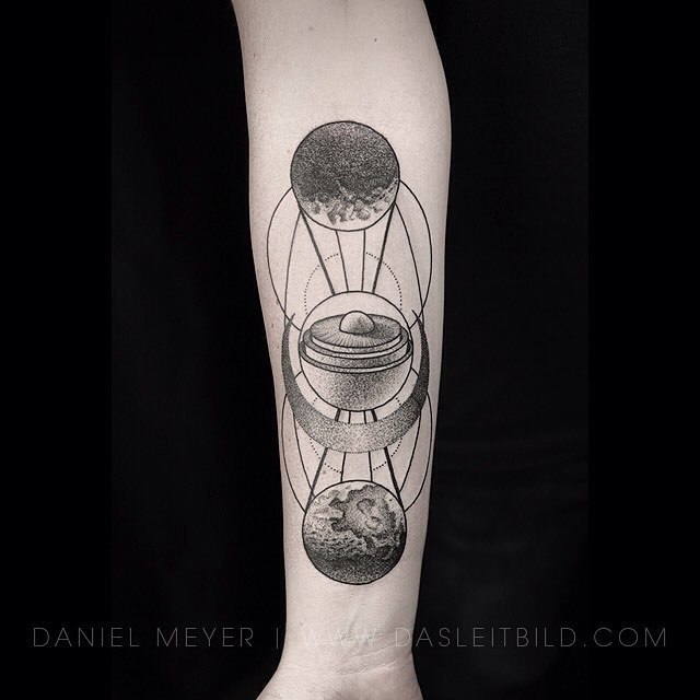 arm tattoo of planet scheme