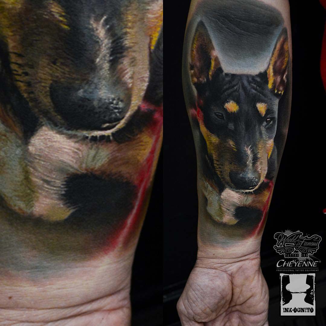 forearm tattoo of dog