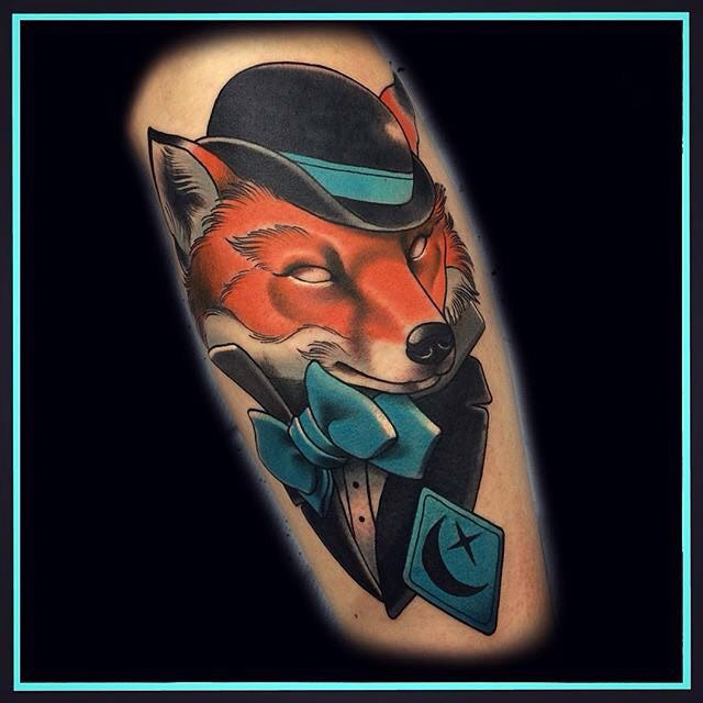 fox tattoo in hat