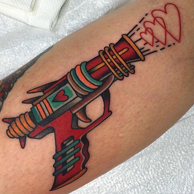 Love gun tattoo neo-traditional