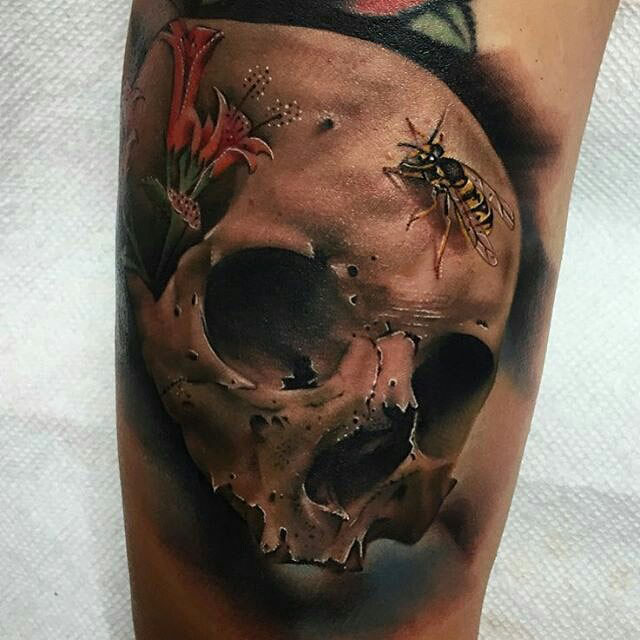 real skull tattoo with bugs