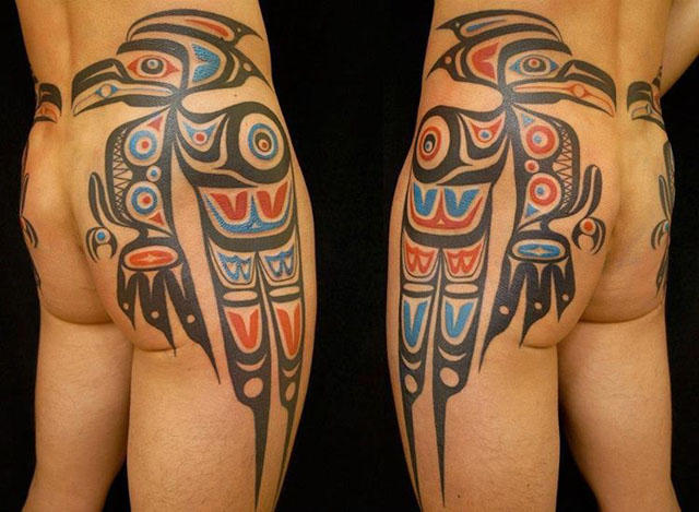 tribal parrot tattoo on hip