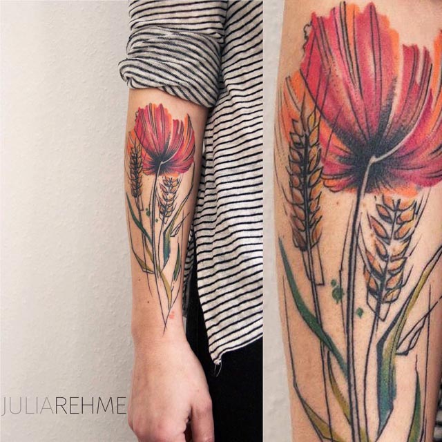 watercolor tattoo poppy on forearm
