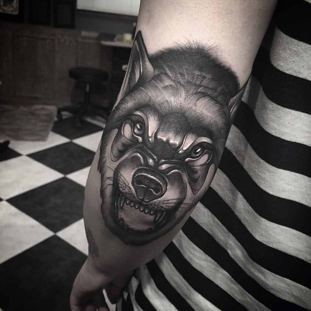 elbow tattoo wolf