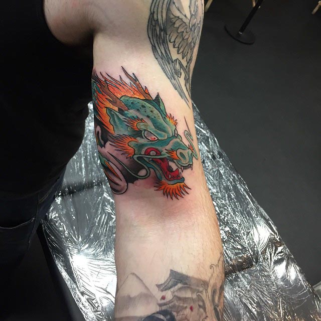 Dragon Bicep Tattoo at walkingcanvas93