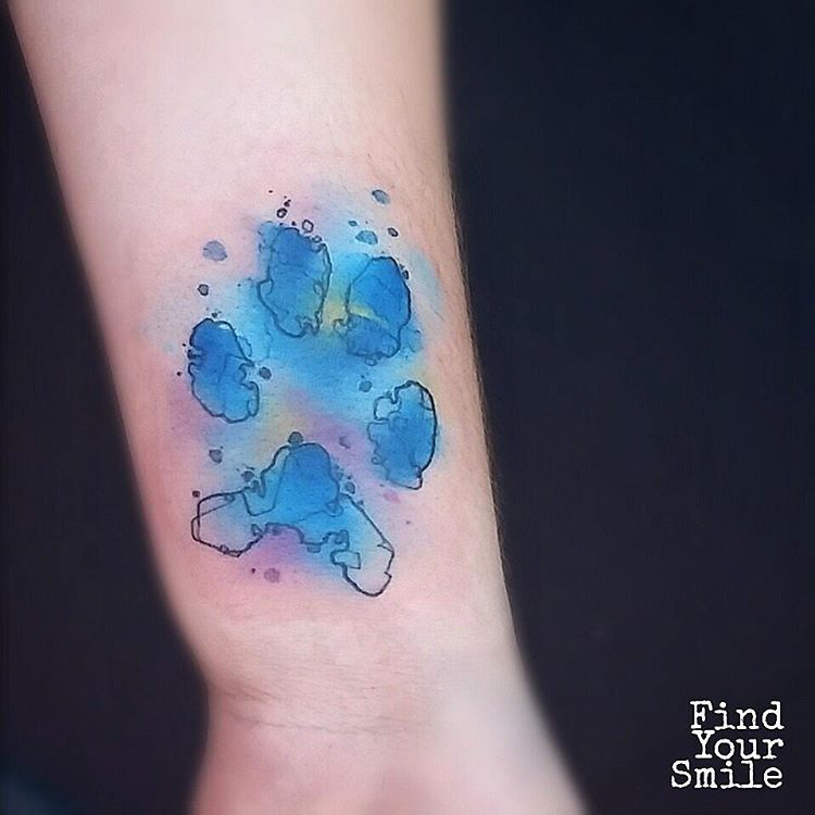 blue paw print tattoo watercolor