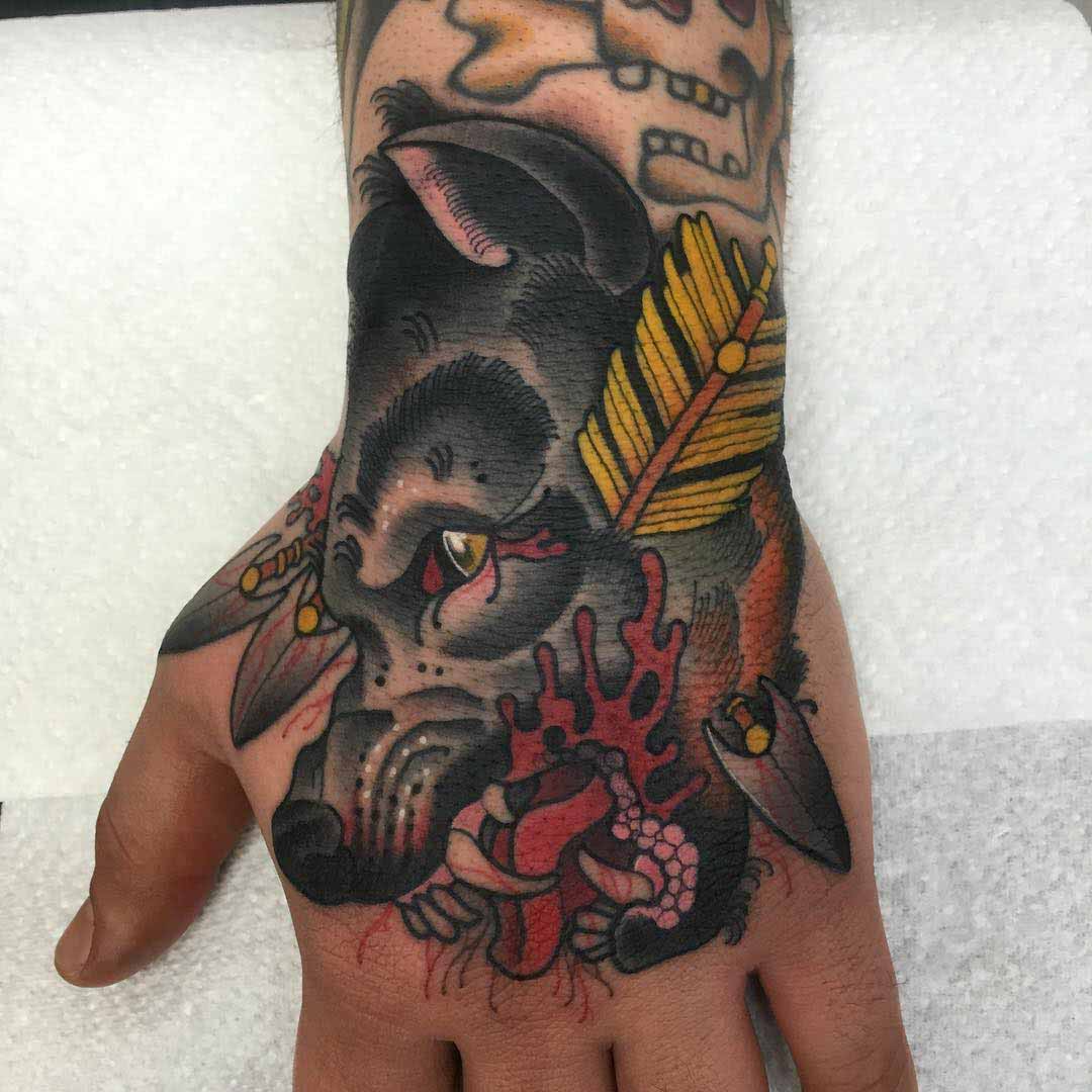 hand wolf neo-traditional tattoo design