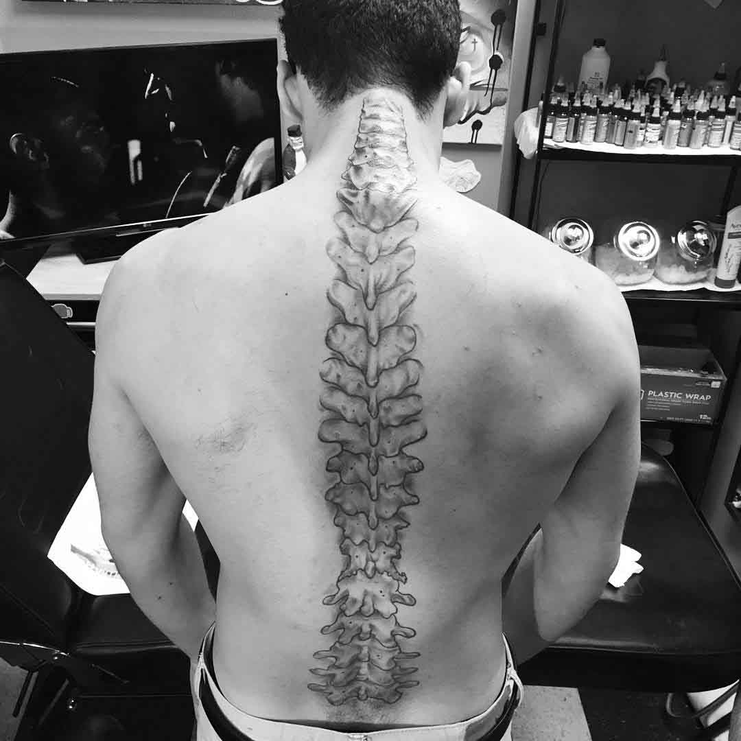 Spine Tattoo Pain  How Much Does It Hurt  Tattify