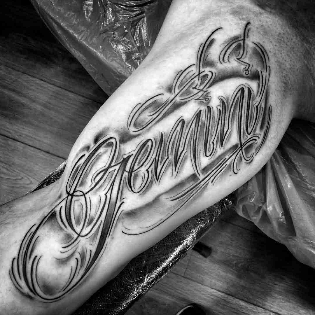gemini inner bicep tattoo lettering