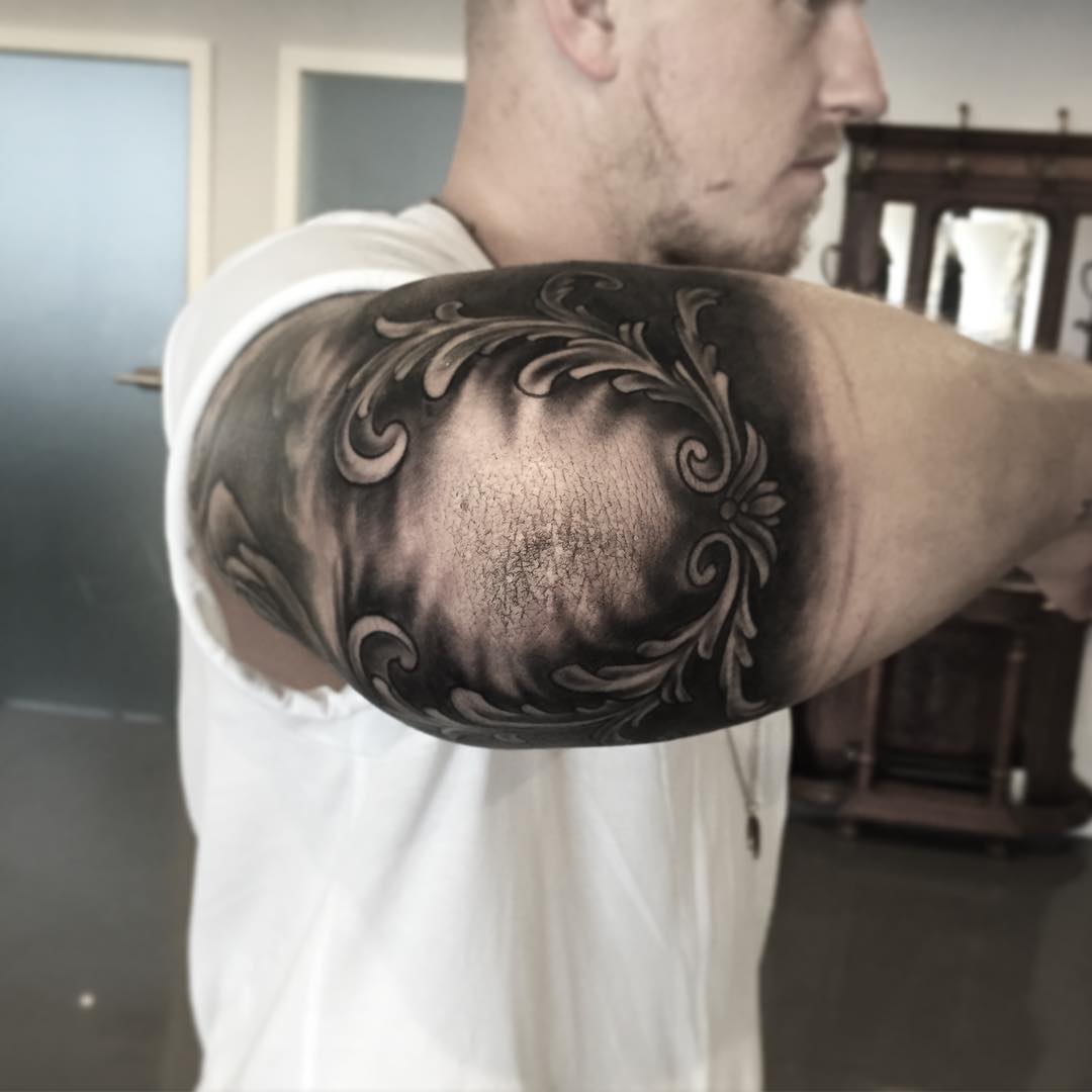 Black and Grey Elbow Tattoo by mrvnttt