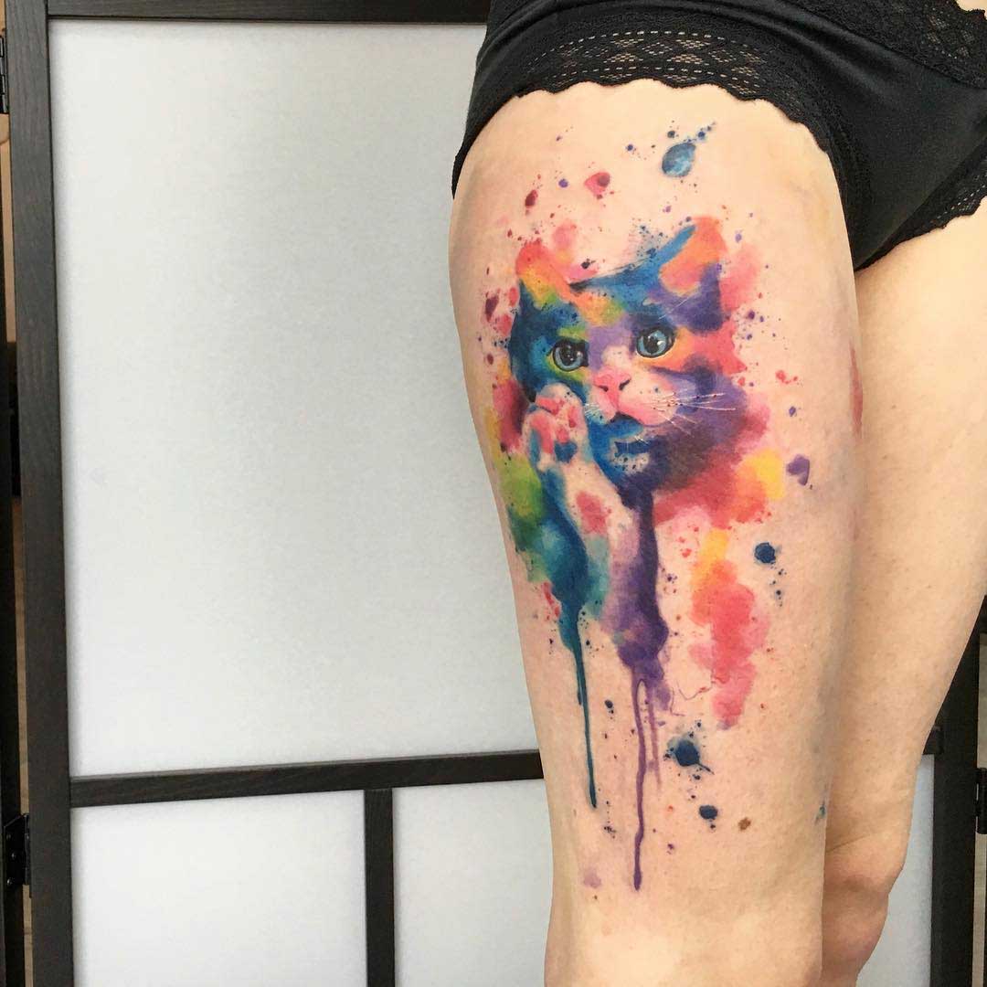 colorful cat tattoo watercolor on thigh