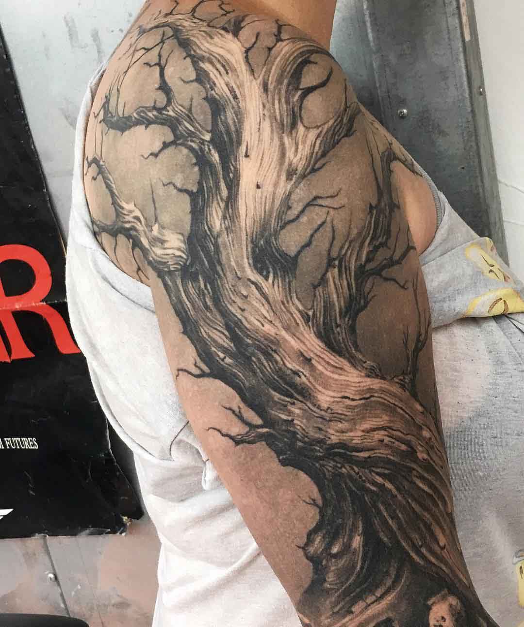 Dead tree tattoo on shoulder