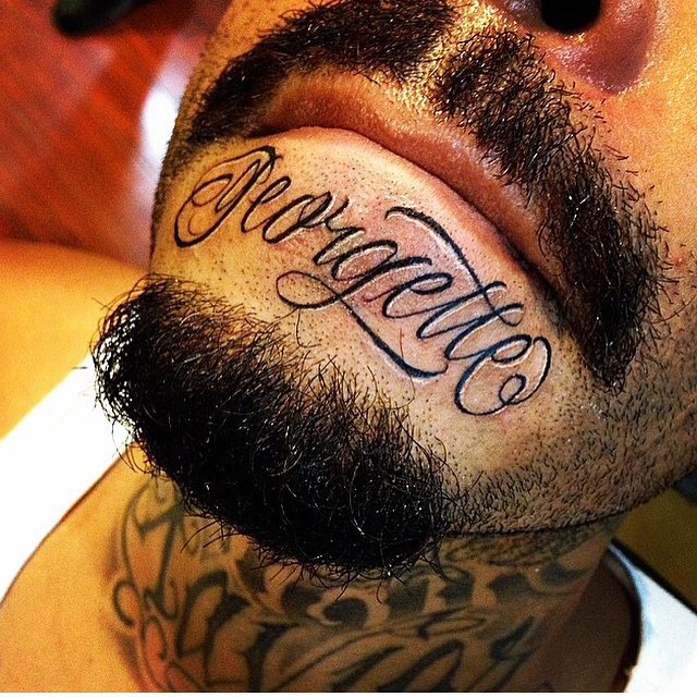 Italic Lettering Chin Tattoo by @saul_tat2