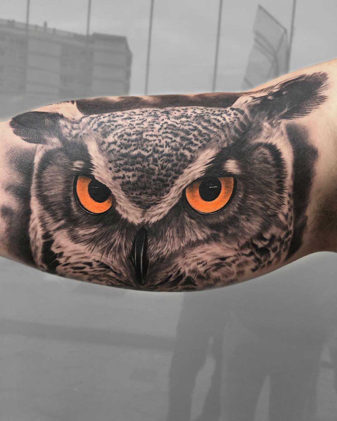 owl tattoo on bicep
