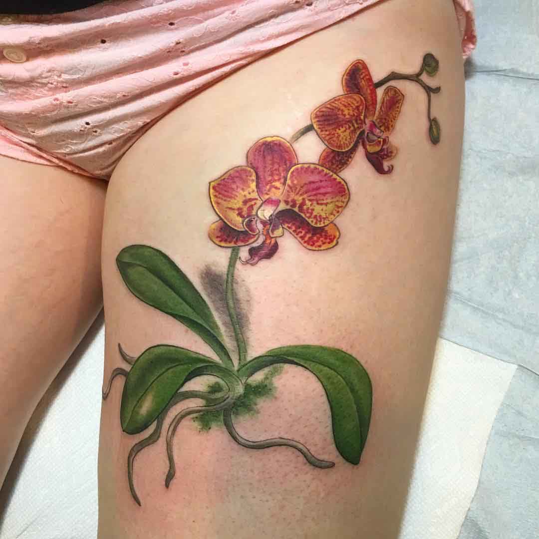thigh tattoo orchid