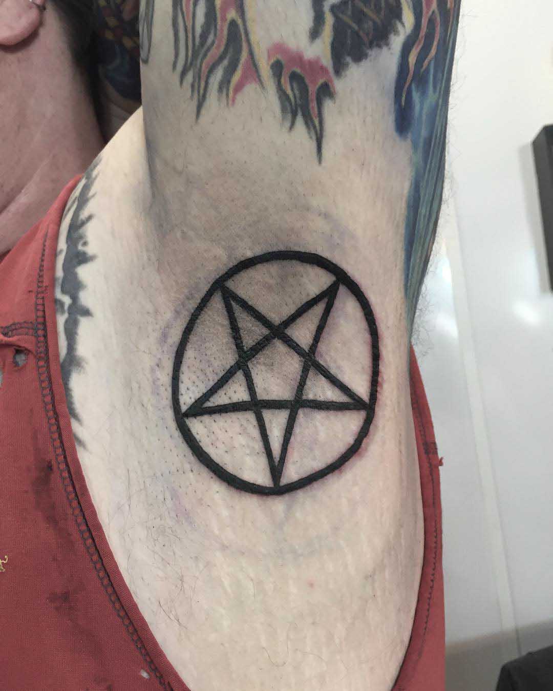 Is having a tattoo of a pentagram star without a circle around it still  considered a satanic symbol? - Quora