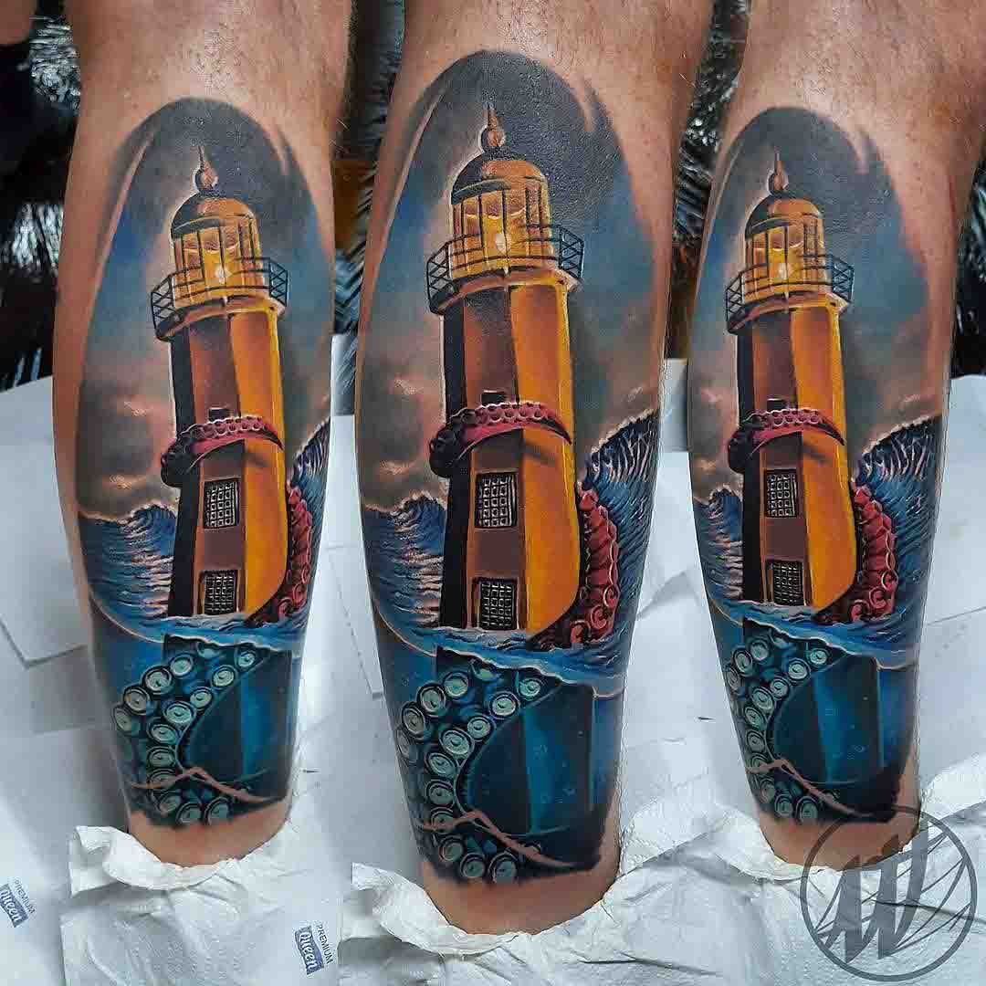Lighthouse tattoo on calf