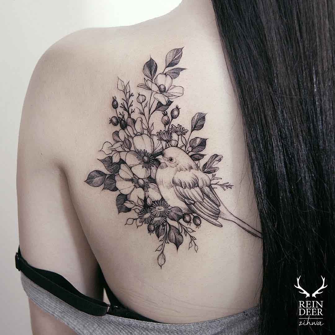 flowers and bird tattoo on shoulder blade for girls