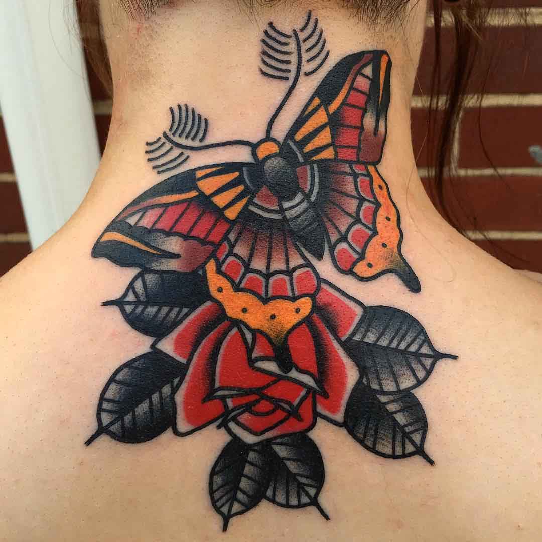 lower back neck tattoo butterfly with flower traditional style