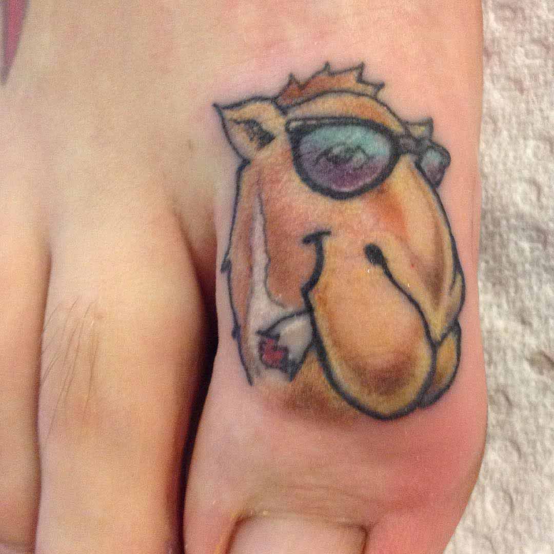 Camel on Toe Tattoo by Chad Tekone.