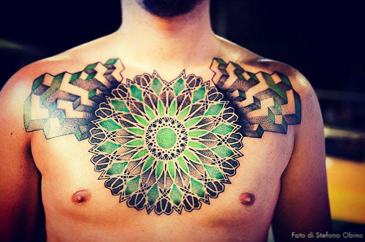 green mandala tattoo on chest
