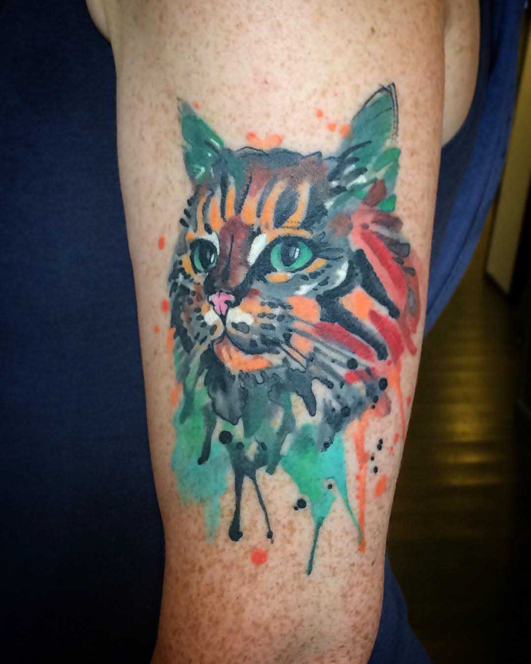 watercolor cat tattoo on arm